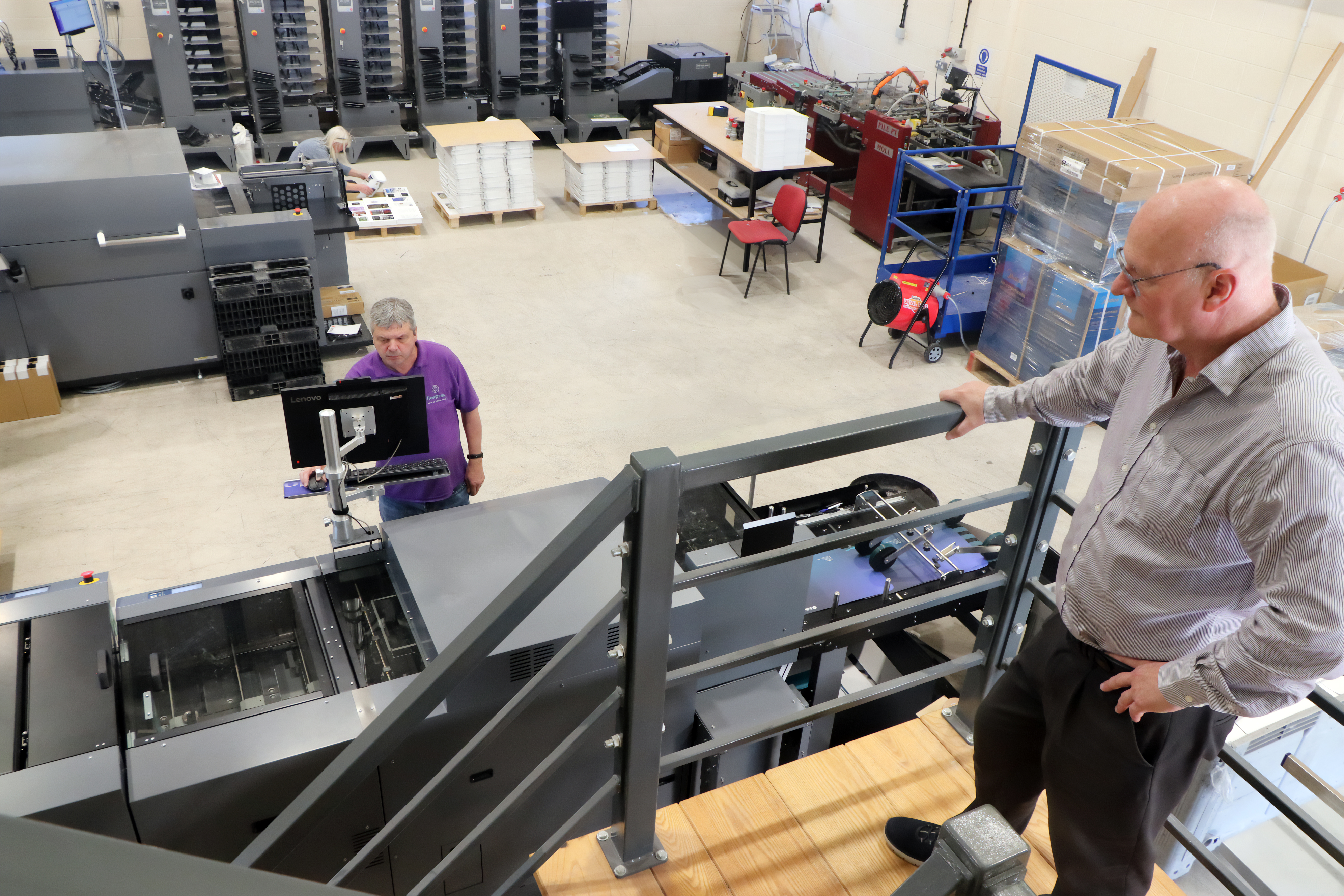 Steve overlooks operations on his DSM-1000 B2 Die-cuter, DC-20K B2 finishing system, DDC-8000 B2 DuSense and DBM-700 Automatic booklet system
