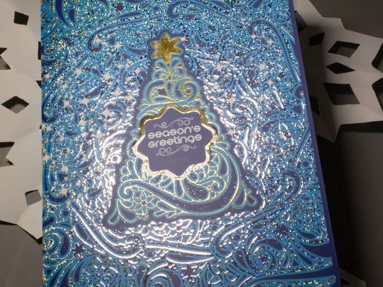 Example of the overuse of print embellishments, detracting from the overall design
